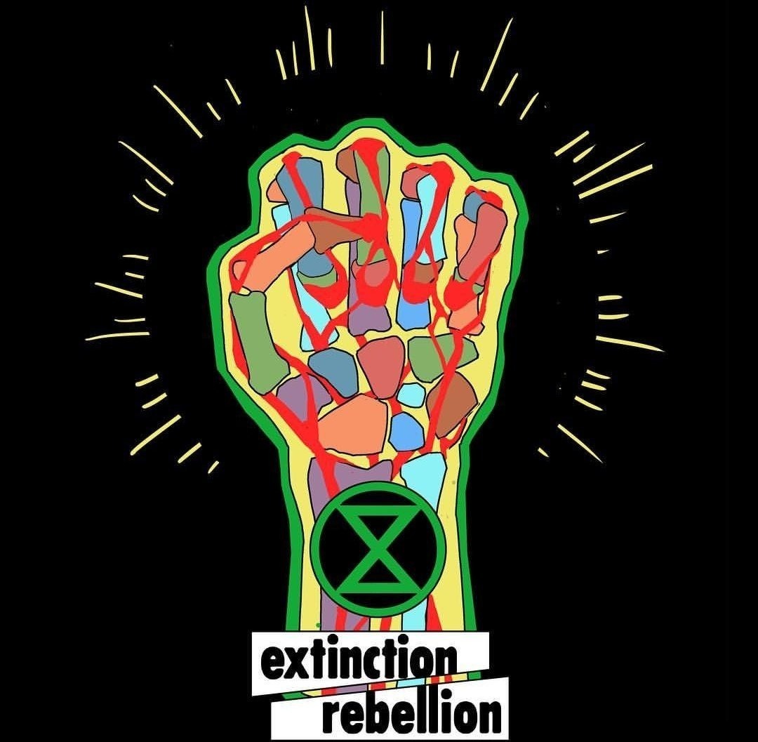 Hora de rebelarse: puño cerrado de Extinction Rebellion
